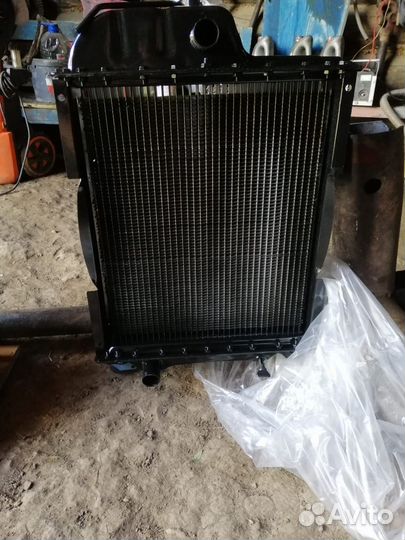 Радиатор на мтз новый и пускачи