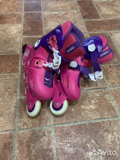 Роликовые коньки