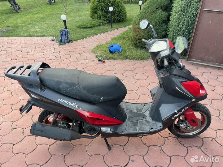 Скутер omaks