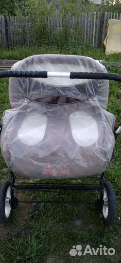 Коляска для двойни