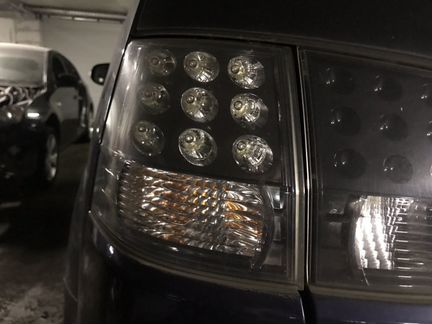Фонарь левый наружный Mitsubishi Outlander XL