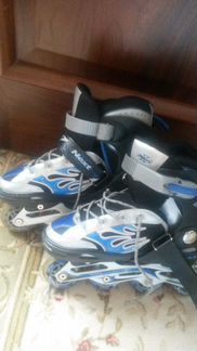 Роликовые коньки