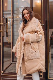 Новый шикарный пуховик с мериносом 46-50