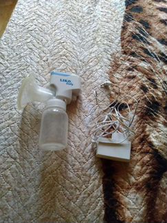 Молокоотсос электрический