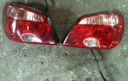 Фонарь заднего хода задний Mitsubishi Outlander 1